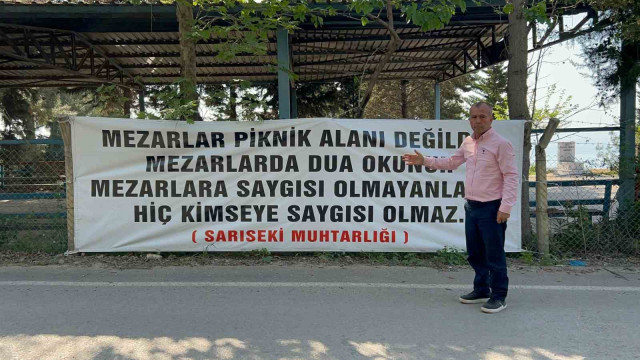 ”Mezarlar piknik alanı değildir” diyen muhtar, mezarlıklarda pikniği yasakladı