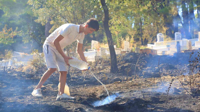 Orman yangınında 12 yaşındaki Eymen’den alkışlanacak hareket